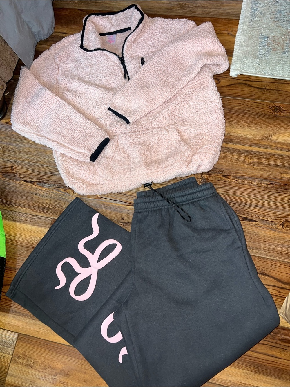 Lot of two size, large jacket, and sweatpants